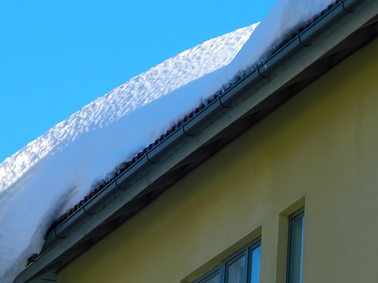 Pile of snow on roof
